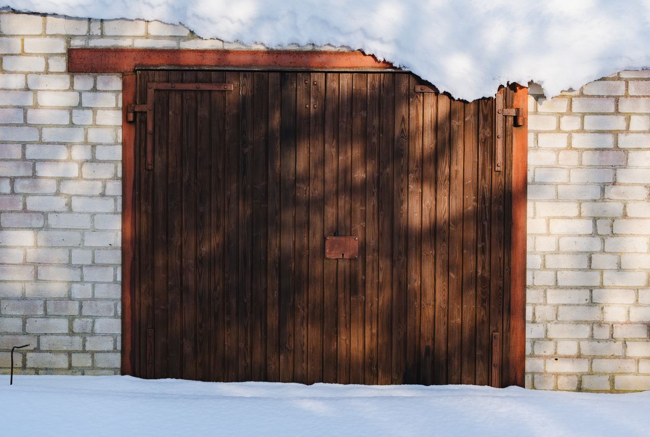 What an Uninsulated Garage Door Means for Your Houston House