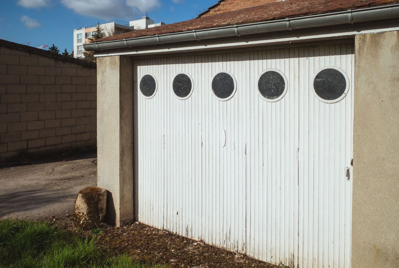 Is Your Old Garage Door Worth Fixing, or Time to Replace It